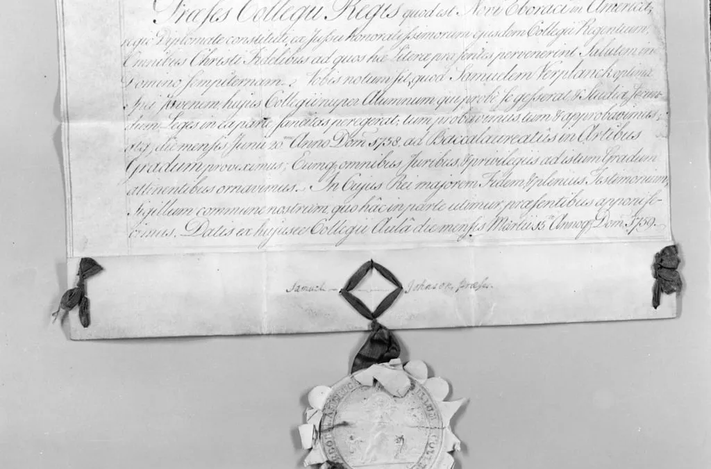 An old handwritten diploma with a wax seal, in black and white